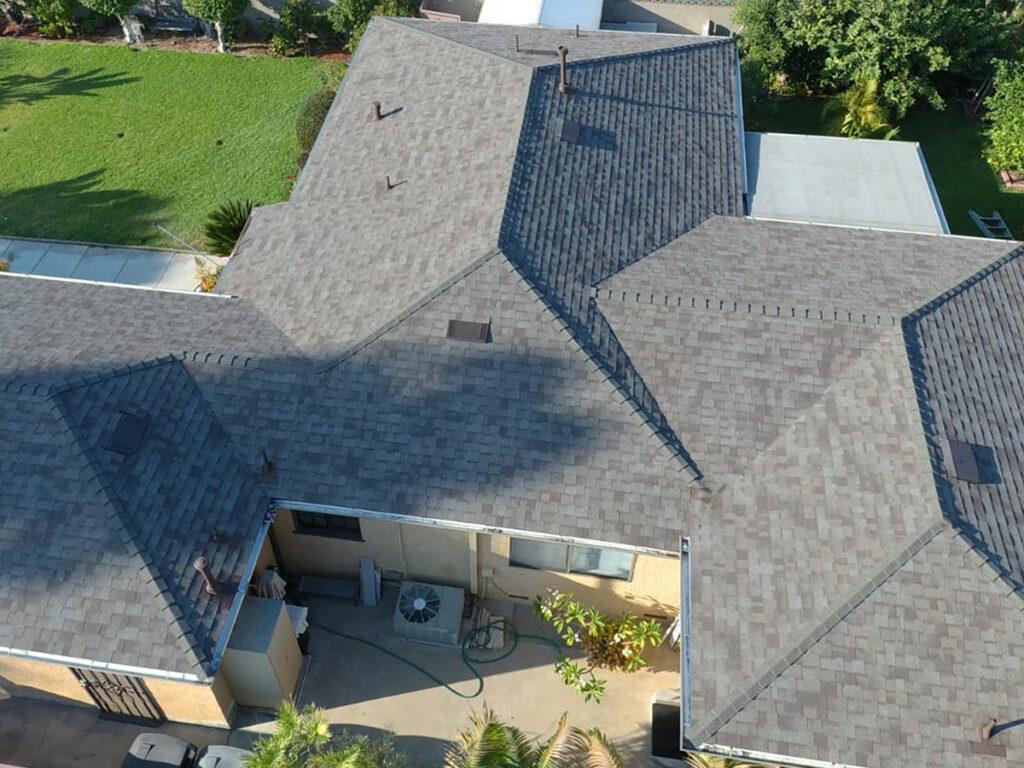 aerial image of a home’s roof and property