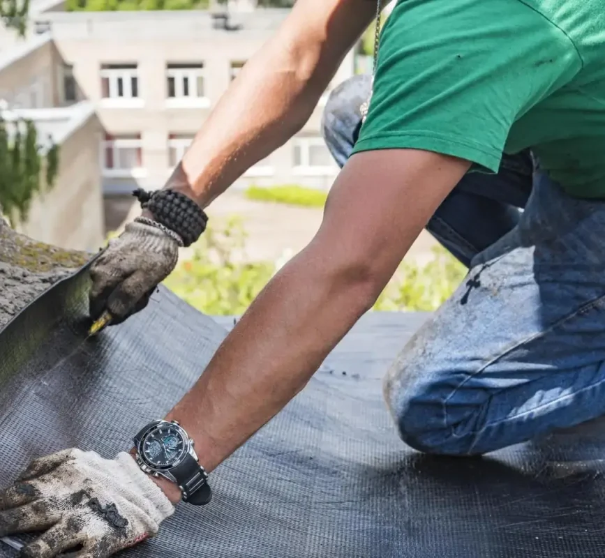 worker-performs-overhaul-roof-residential-building